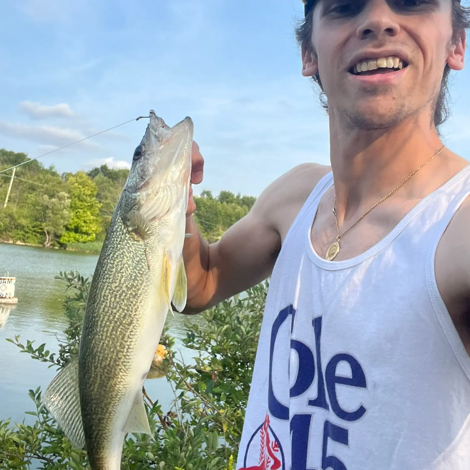 Jamesville boy reels in big bass while fishing with father on